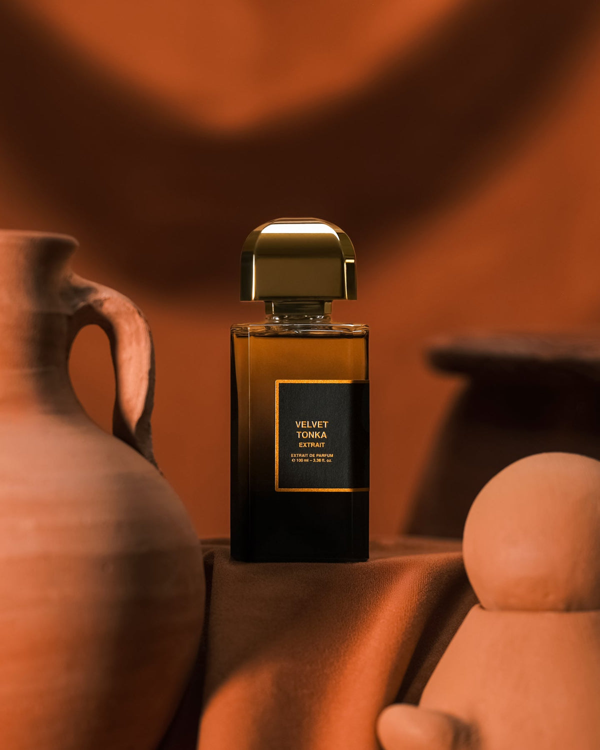 BDK Parfums Velvet Tonka Extrait among terracotta pottery, inspired by Morocco