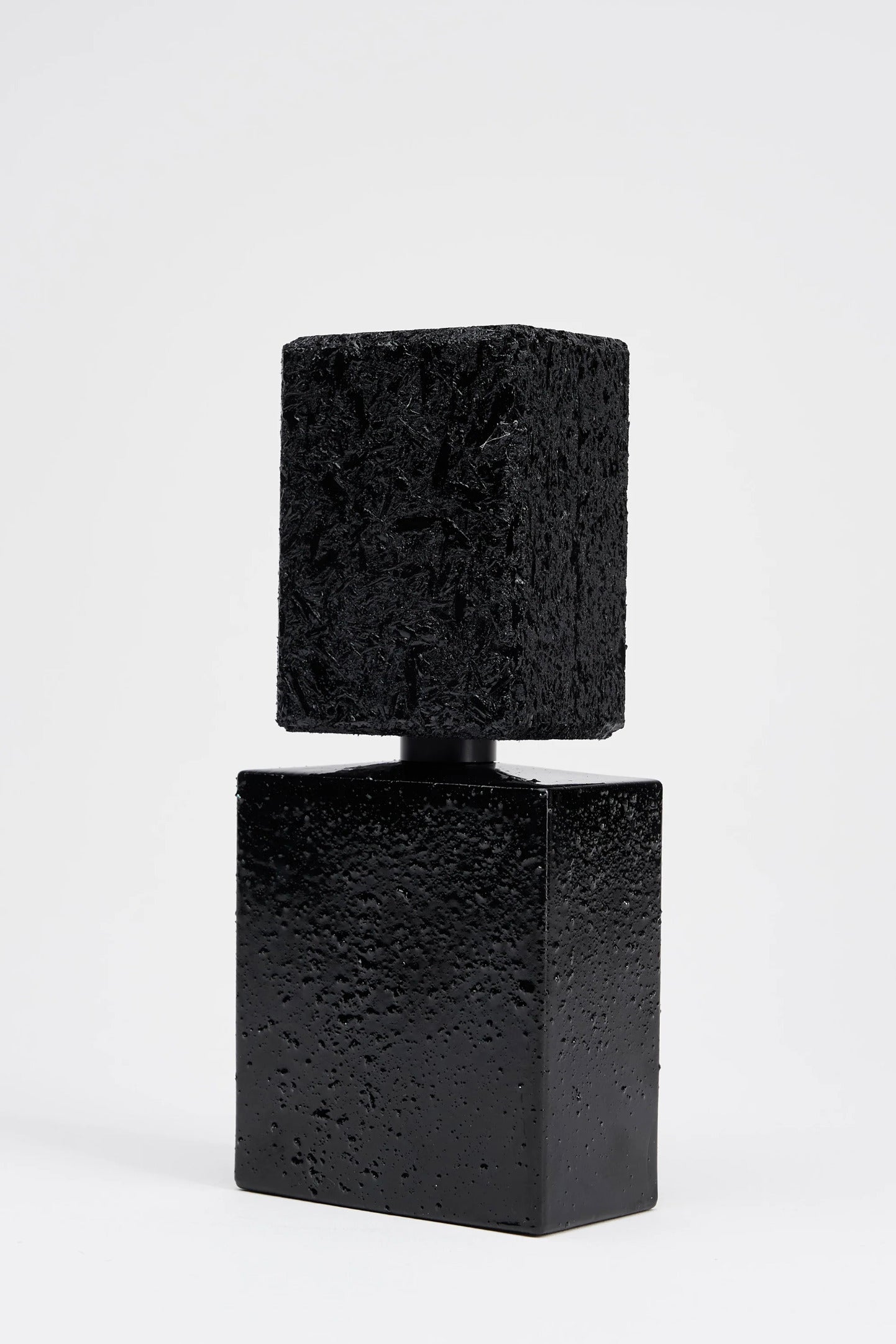 Ennui Noir is a woody aromatic fragrance with a masculine edge and a blast of lavender for balance
